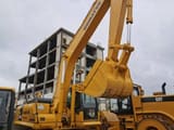 2019 Komatsu PC300-7 crawler excavator, side view with raised boom