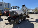 2020 Wacker Neuson EW100 wheel excavator, rear three-quarter view