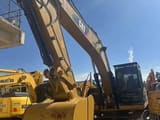2022 Caterpillar 330D crawler excavator, front-quarter view