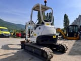 2010 Kubota U25-3EU mini excavator, rear three-quarter view