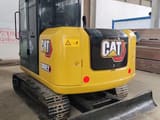 2022 Caterpillar 306E2 mini excavator, rear three-quarter view