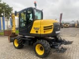 2021 Yanmar B95W wheel excavator, rear three-quarter view