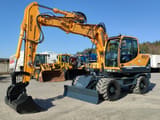 2014 Hyundai R140W-9 wheel excavator, side profile view