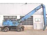 2011 Fuchs MHL350D material handler, side profile view