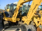 2020 Komatsu PC55MR mini excavator, front three-quarter view