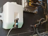 2023 Volvo EC210 crawler excavator fluid reservoir and electrical component detail