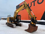2015 Caterpillar 312 EL crawler excavator, side view