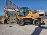 CASE WX148 wheel excavator, side profile view