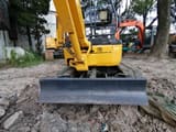 2024 Komatsu PC18MR-2 excavator, rear view with blade