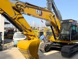 2022 Caterpillar 320GX crawler excavator, front three-quarter view