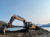 2019 Caterpillar 323 crawler excavator, side profile view