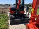 Kubota KX163 mini excavator rear view