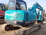 2024 Sunward SWE70N9 mini excavator, rear three-quarter view