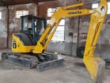 Komatsu PC50MR mini excavator, side view