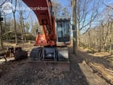 2003 Atlas 1404 wheel excavator, rear view with blade