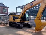 2021 Caterpillar 320 crawler excavator, side view