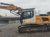 Liebherr 922 crawler excavator, side view