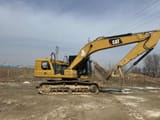 2021 Caterpillar 320GC crawler excavator, side view
