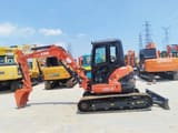 2022 Kubota U55-4 mini excavator, side profile view