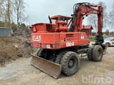 1992 Atlas 1304 wheel excavator, rear three-quarter view