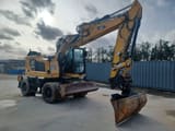 2018 Caterpillar M315F wheel excavator, side view