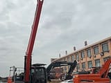 2018 Doosan DX140LC crawler excavator with long-reach boom, side view