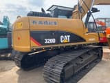 Caterpillar 320D rupsgraafmachine uit 2010, achteraanzicht driekwart