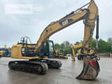 2014 Caterpillar 320EL crawler excavator, side view