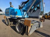 2016 Fuchs MHL331 material handler, side view