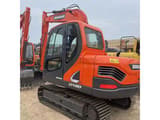 2023 Doosan DX80 mini excavator, rear three-quarter view
