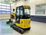 2023 Caterpillar 301.8-05A mini excavator, rear three-quarter view