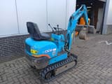 2001 Kubota K-008 mini excavator, rear three-quarter view