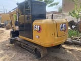 Caterpillar 306D mini excavator, rear three-quarter view