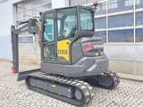 2023 Volvo ECR58F mini excavator, rear three-quarter view