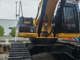 2023 Caterpillar 340D crawler excavator, rear-quarter view
