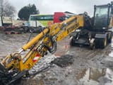 Hydrema MX16 RAIL wheel excavator, front three-quarter view