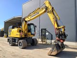 2023 Komatsu PW180-11E0 wheel excavator, side view