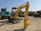 2024 Komatsu PC35 mini excavator, front three-quarter view