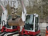 2018 Takeuchi TB250 mini excavator, front three-quarter view