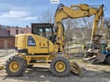 2013 Komatsu PW118 MR-8 wheel excavator side view