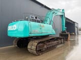 2014 Kobelco SK500LC-9 crawler excavator, rear three-quarter view