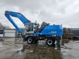 2012 Fuchs MHL360 material handler side view
