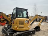 2023 Caterpillar 303.5ECR mini excavator, rear three-quarter view