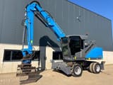 2022 Fuchs MHL320F material handler, front three-quarter view