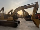 2024 Caterpillar 320GC crawler excavator, side view