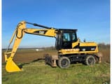 2009 Caterpillar M322D wheel excavator, side profile view