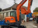 2023 Doosan DX55-9C mini excavator, side view