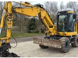 2021 Komatsu PW98MR-11E0 wheel excavator, front three-quarter view