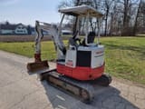 2018 Takeuchi TB23R mini excavator, rear three-quarter view
