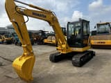 2022 Komatsu PC56-7 mini excavator, front three-quarter view